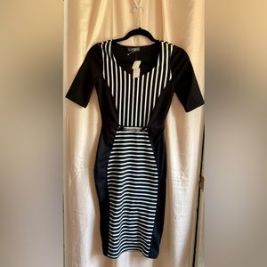 Black & White  below knee length dress with built in belt. Short sleeves. S-LP.